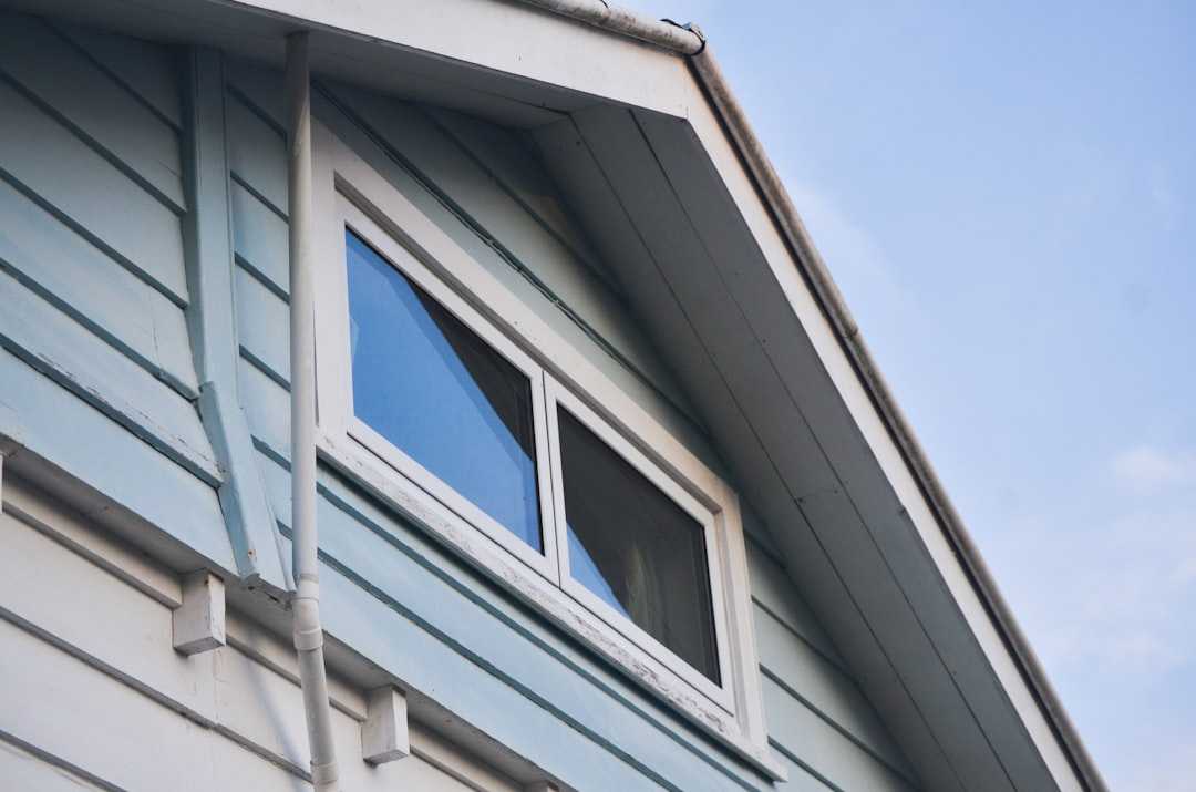 EIFS siding repair damage on home exterior