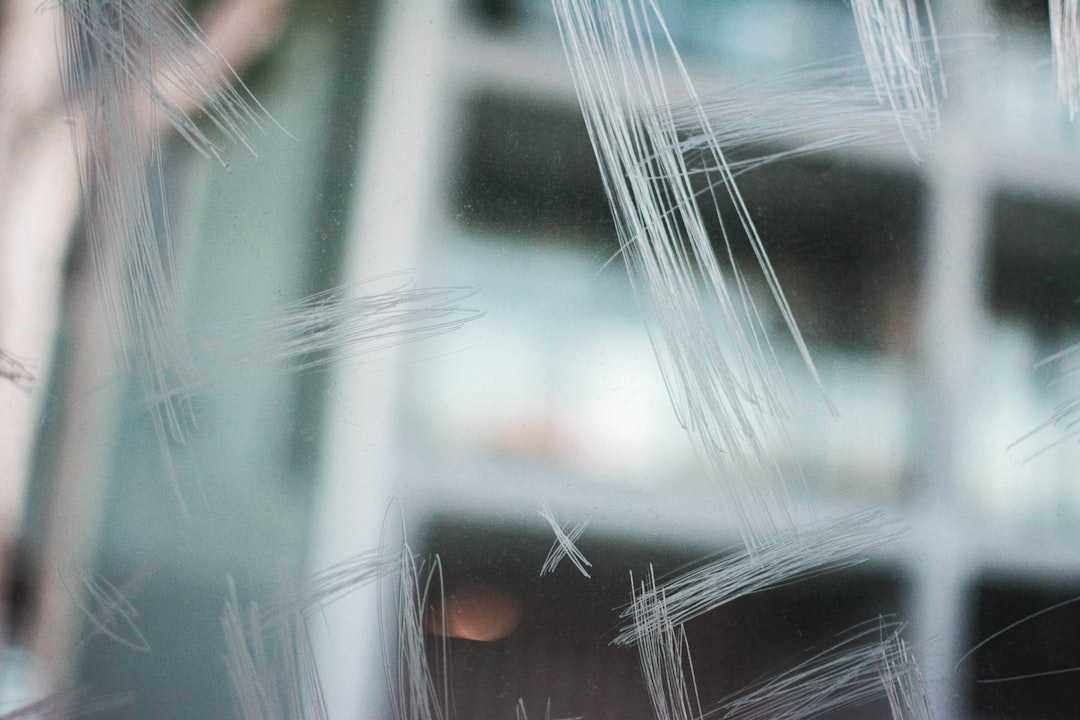 glass scratch repair close-up inspection