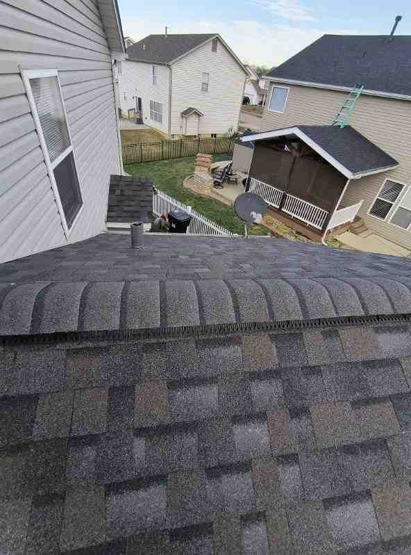 chimney cricket clean roof saddle water diversion
