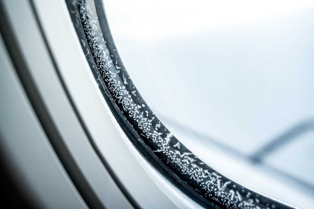 Cracked and hardened rubber window gasket requiring replacement